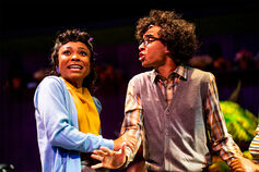Two student actors performing on stage.